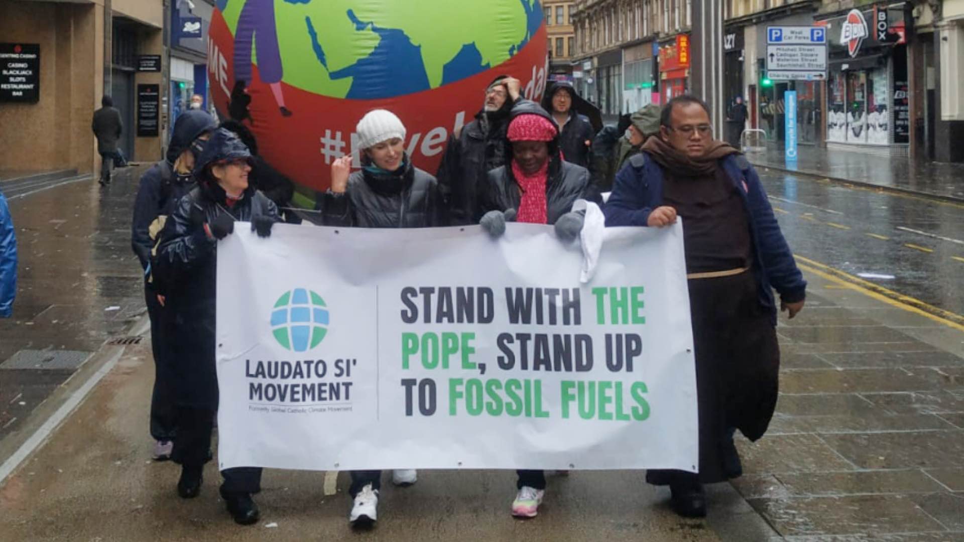 Catholics march at COP26 in Glasgow