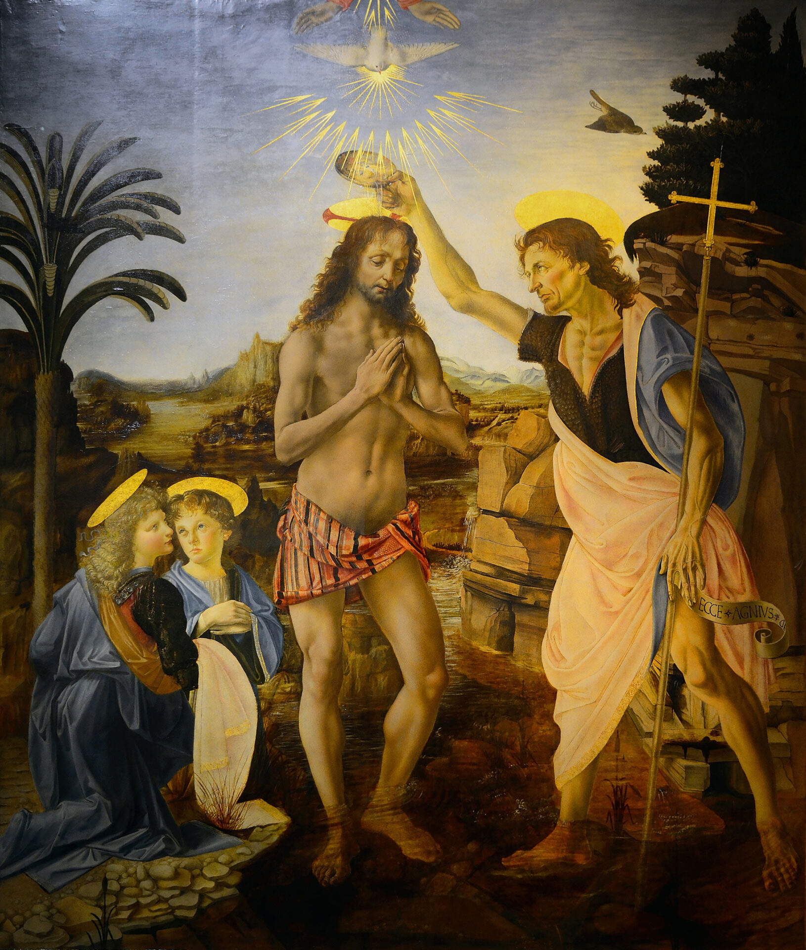 (Andrea del Verrocchio, Leonardo da Vinci e altri, Battesimo di Cristo, Galleria degli Uffizi, Firenze, 1475)