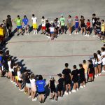 Enfoque integral MLS. Personas conforman un corazón.